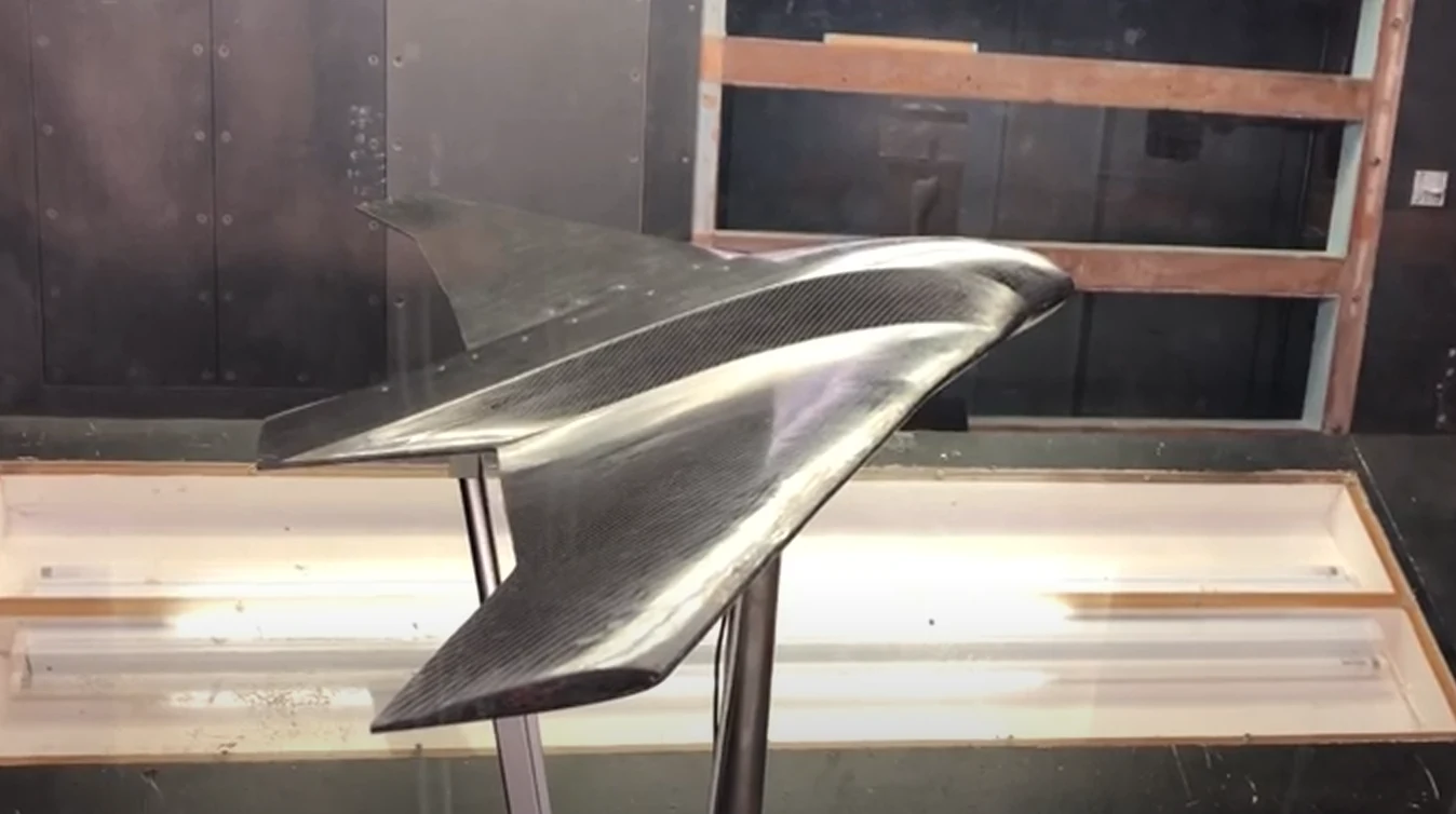 Green Raven carbon-fibre blended-wing-body model mounted in a wind tunnel